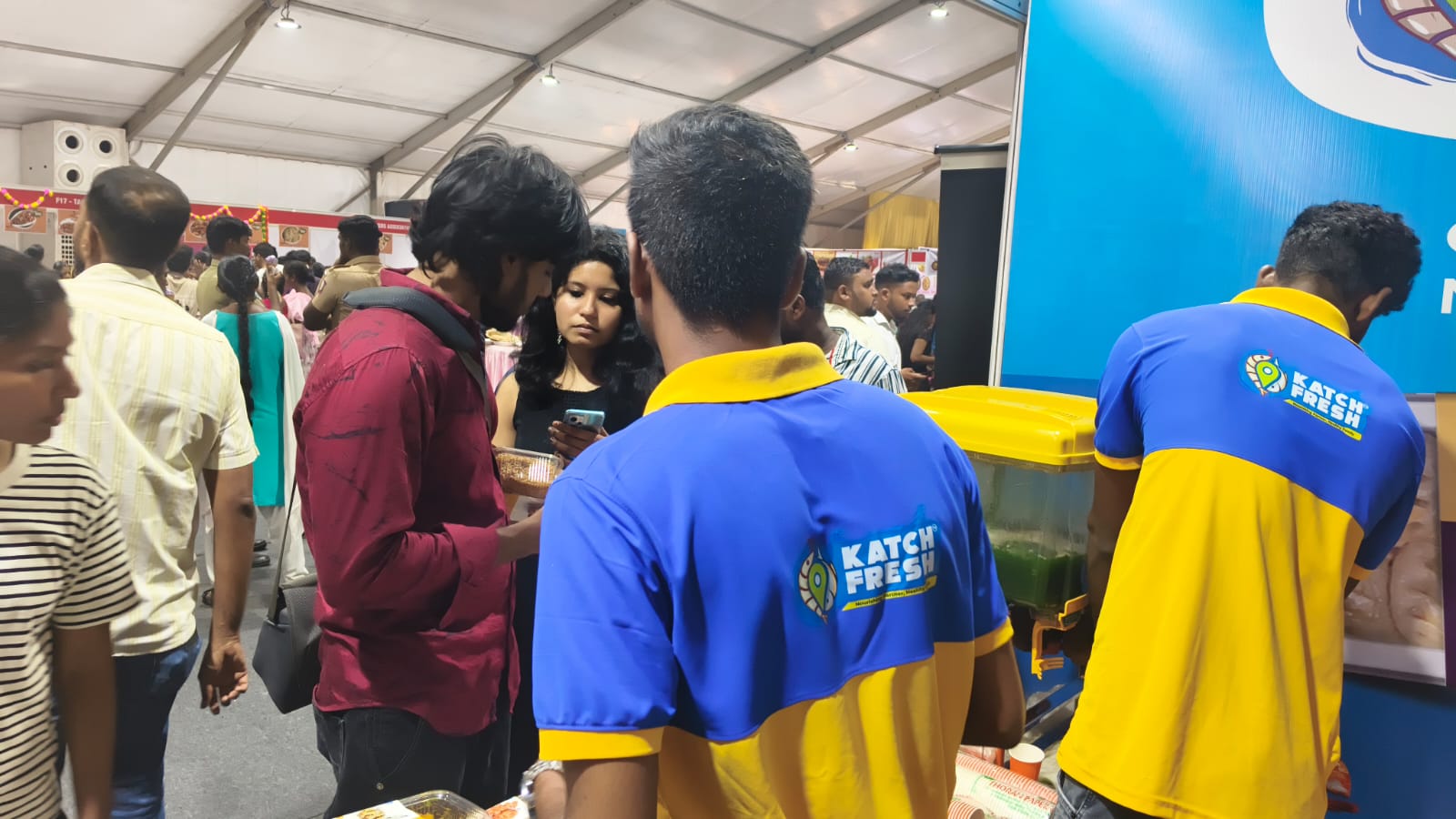KatchFresh team with community members